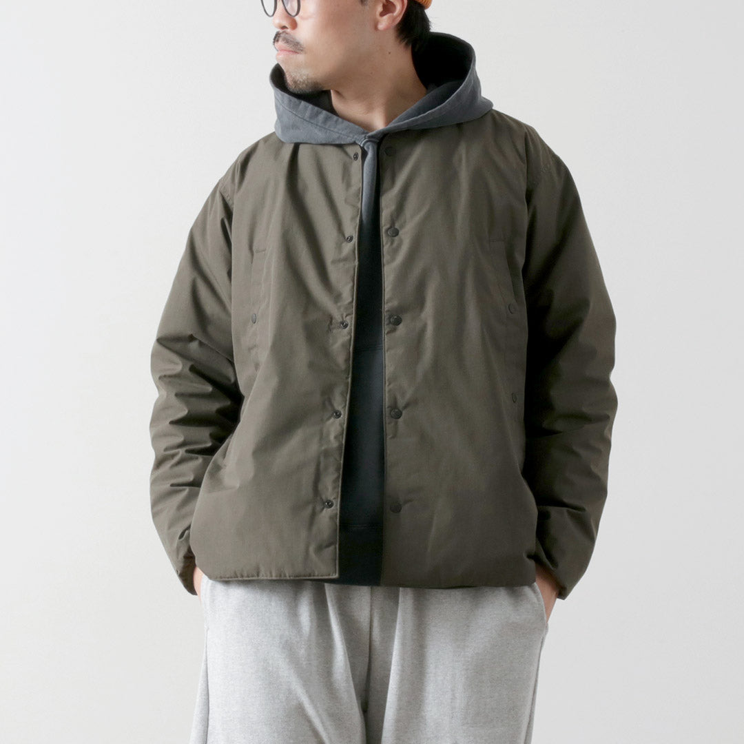 Chaqueta tipo cárdigan de plumas NANGA/HINOC Modelo 2025