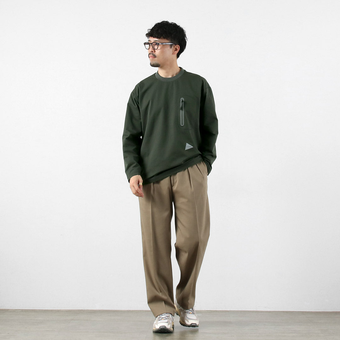AND WANDER / T-shirt hybride à manches longues et poche chaude