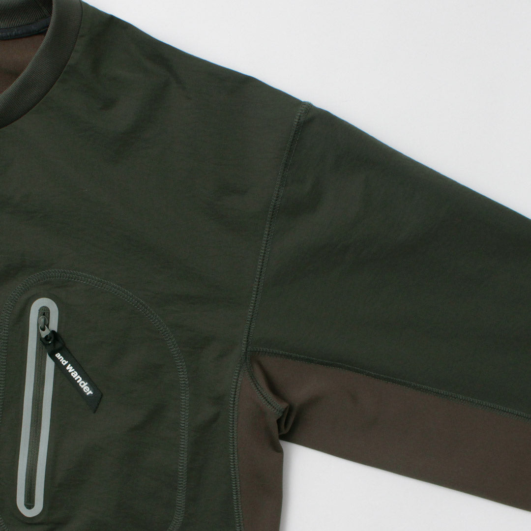 AND WANDER / T-shirt hybride à manches longues et poche chaude