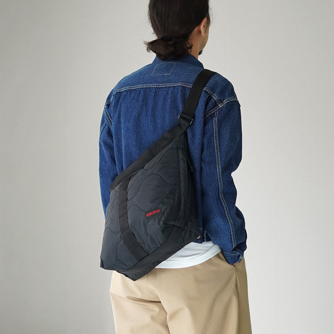 BRIEFING / Jersey acolchado M Bolso de hombro A4
