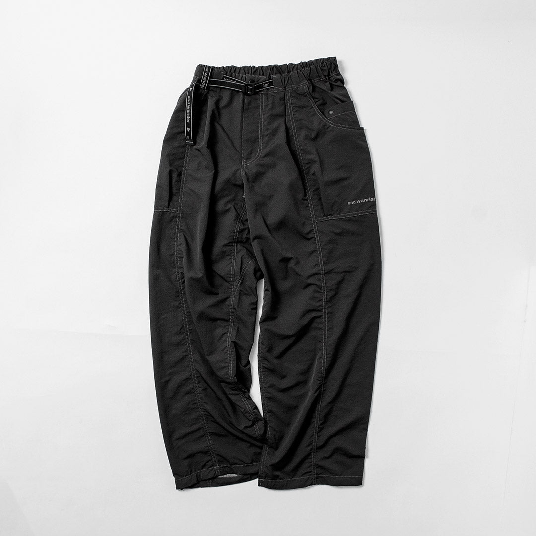 AND WANDER / Crinkle Nylon Pants
