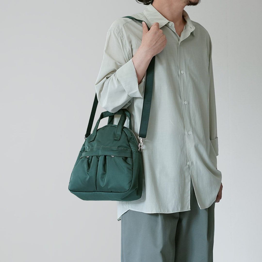 NEWBOOK / Bolso de hombro triangular Hangout / Bolso