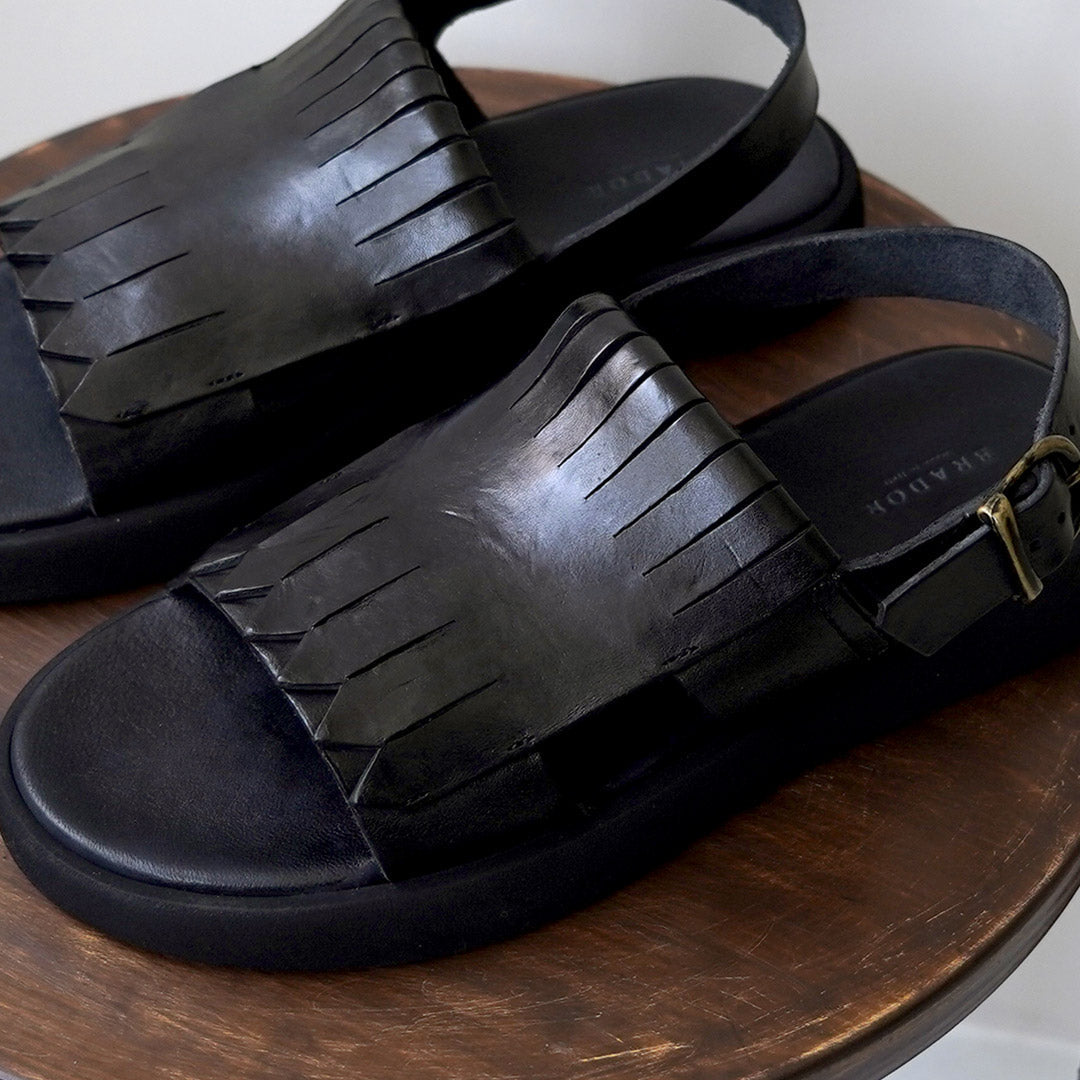 BRADOR / Sandales en cuir à plateforme et franges
