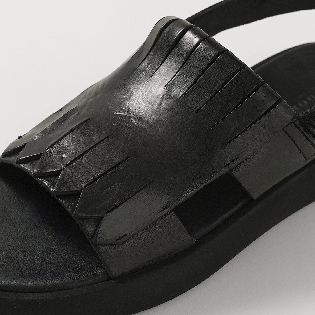 BRADOR / Sandales en cuir à plateforme et franges