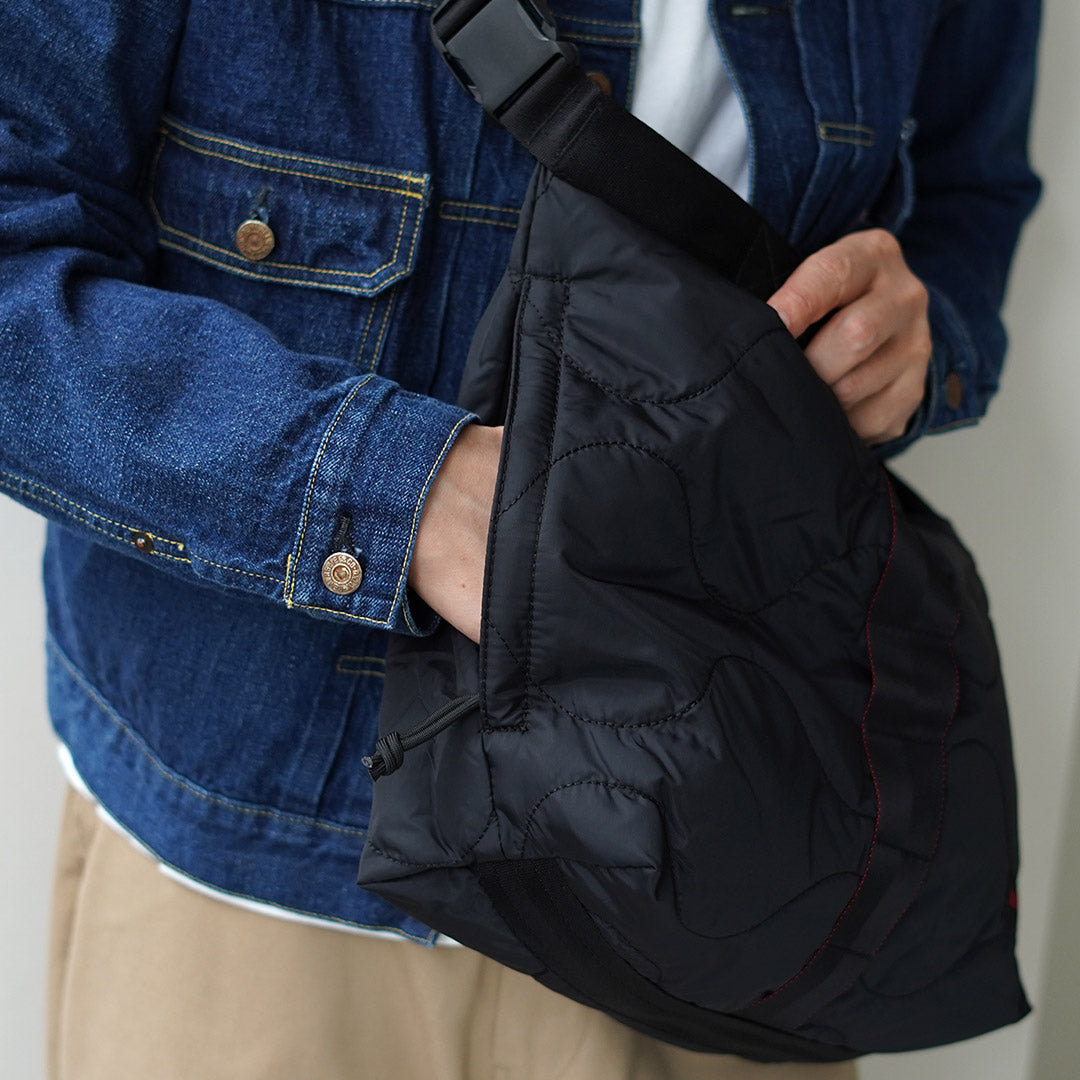 BRIEFING / Jersey acolchado M Bolso de hombro A4