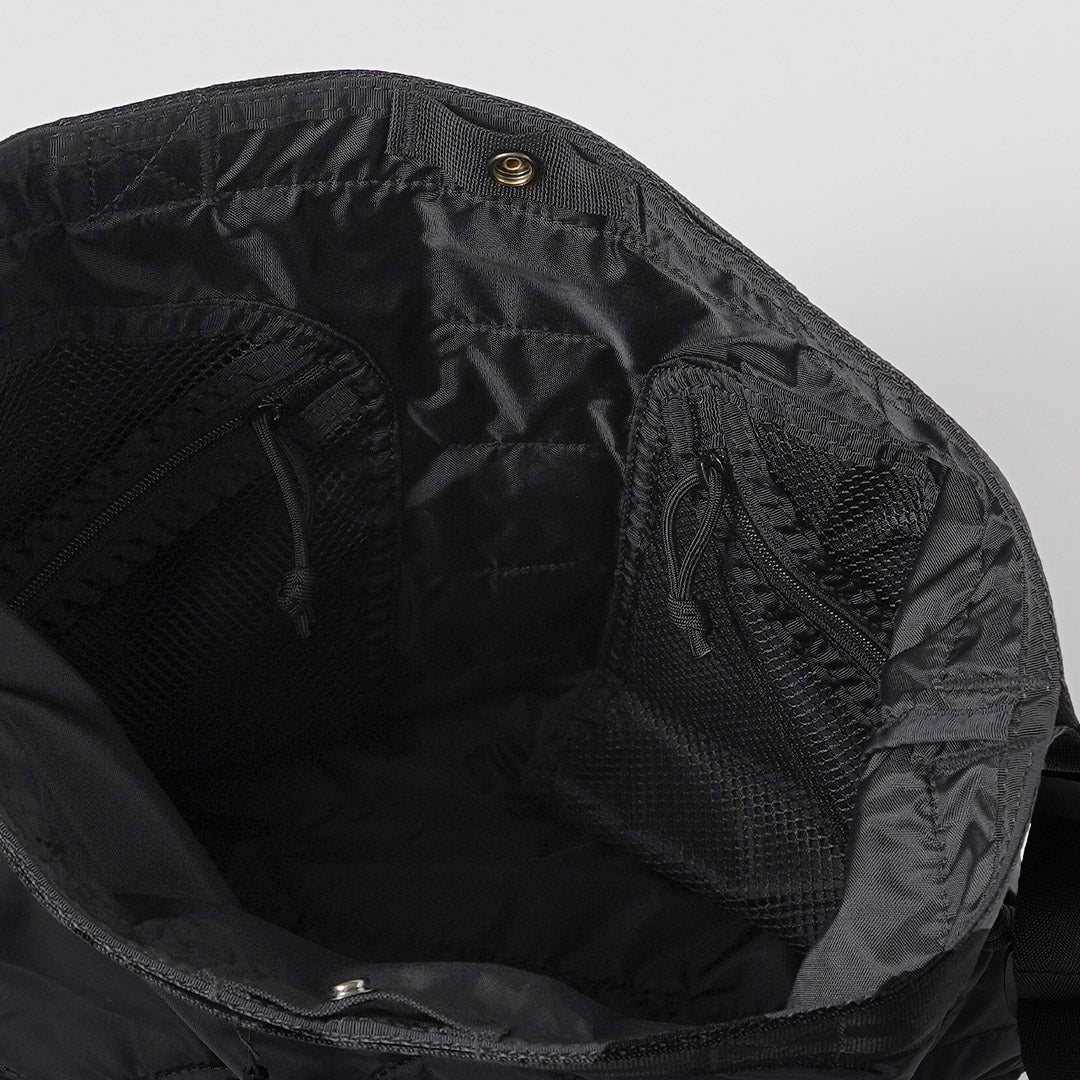BRIEFING / Jersey acolchado M Bolso de hombro A4