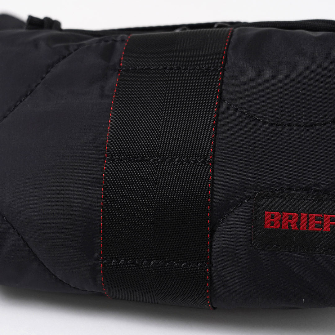 BRIEFING / Bolso de hombro acolchado Walker Body Bag